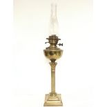 Victorian brass oil lamp with brass reservoir and