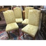A set of four upholstered dining chairs. Shipping category D.
