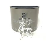 Boxed Swarovski reindeer , postage cat d. No obvio