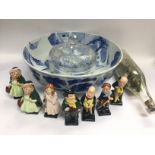 Six Royal Doulton Dickens figures, a blue and whit