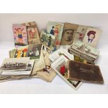 A large collection of vintage postcards etc.