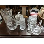 A collection of glass cut vases and other glass wa