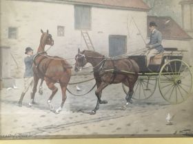 A framed watercolour study of a horse drawn carria