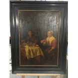 A framed Dutch oil painting figures seated at a ta