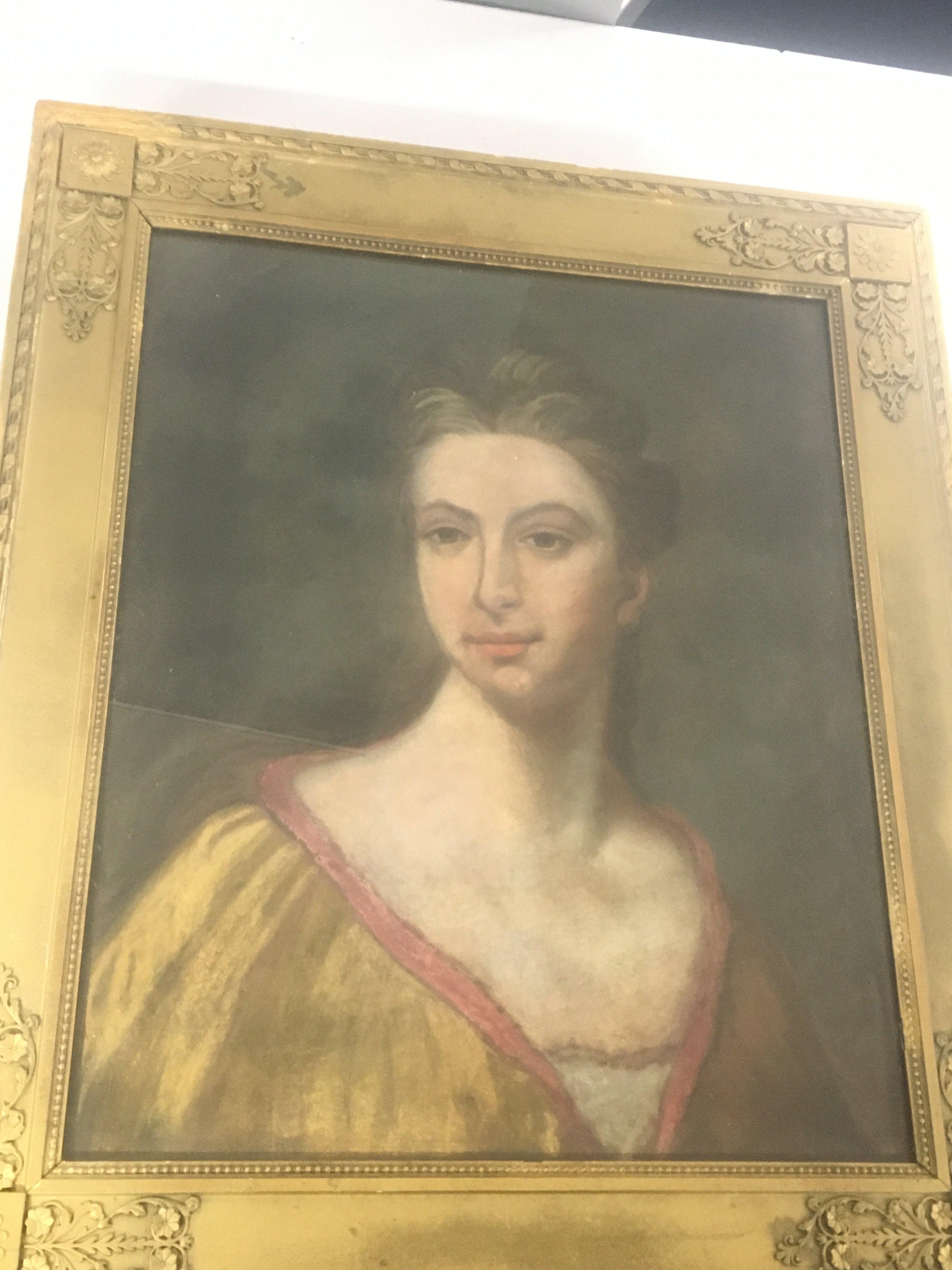 A framed early 19th century pastel portrait of an