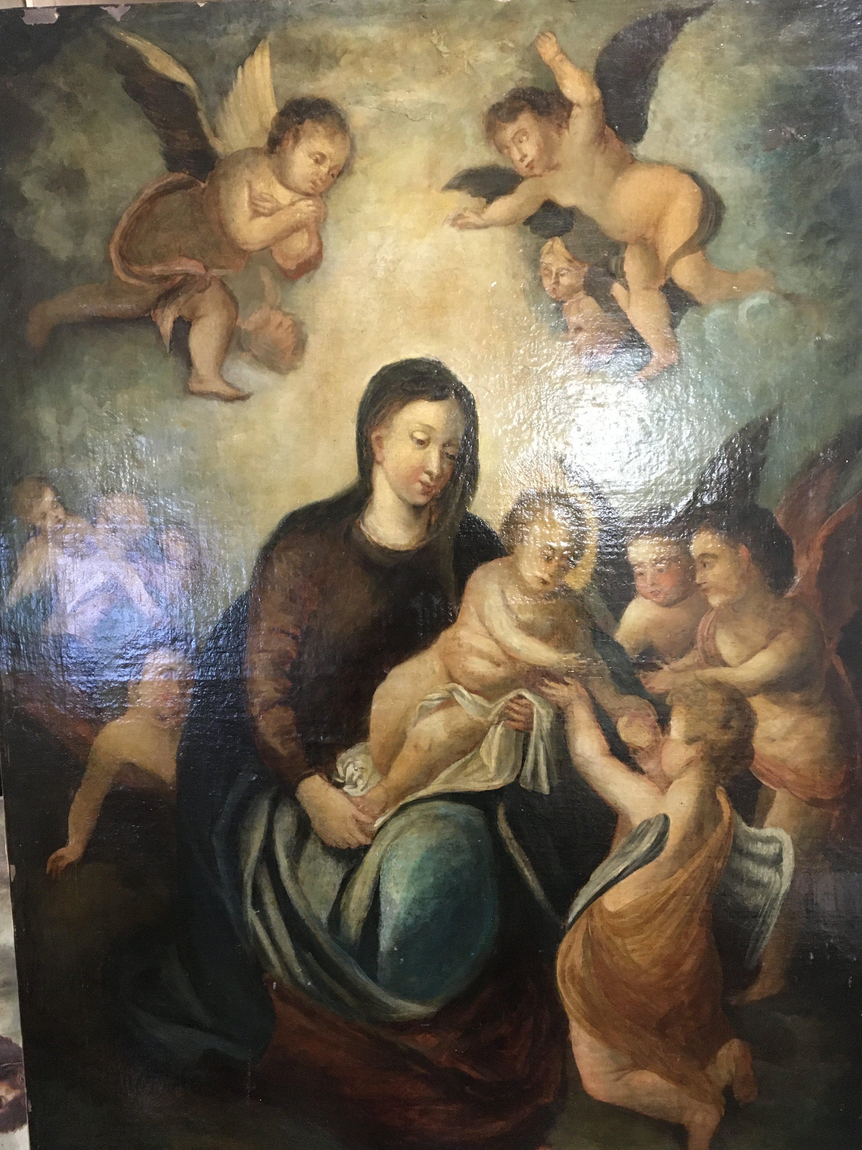 An unframed oil painting on canvas of the Madonna