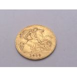 A gold 1910 half sovereign.