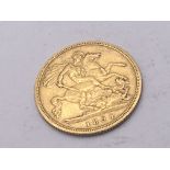 A Victorian gold half Sovereign dated 1894.