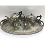 A four piece silver plated tea set and a large sil