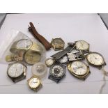 A collection of gents watches dials and parts spar