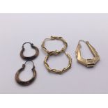 Two pairs of gold earrings and an odd earring (5)