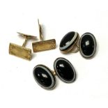 A pair of 14ct yellow gold cufflinks together with
