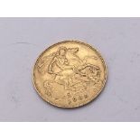 An Edwardian gold half sovereign dated 1909