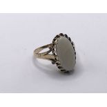 A 9carat gold ring set with an oval Opal ring size