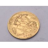 A George V gold half sovereign dated 1914.