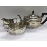 A three piece silver tea set Birmingham hall marks