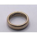 A 9carat gold wedding band weight 7g ring size O.