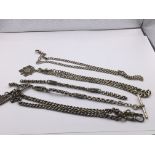 A collection of silver watch chains. (4)