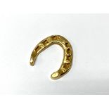 A novelty 9ct gold horseshoe, 4.98g, Marks for bir