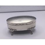 A silver trinket box with Birmingham hallmarks. Th