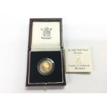 A cased 1996 gold sovereign with COA. Shipping cat