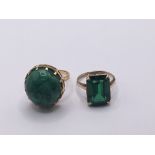 A 9carat gold ring inset with a green stone and an