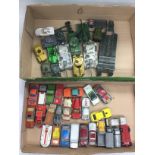 A collection of playworn die cast vehicles compris