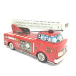 Japanese tin plate fire engine in mint condition.