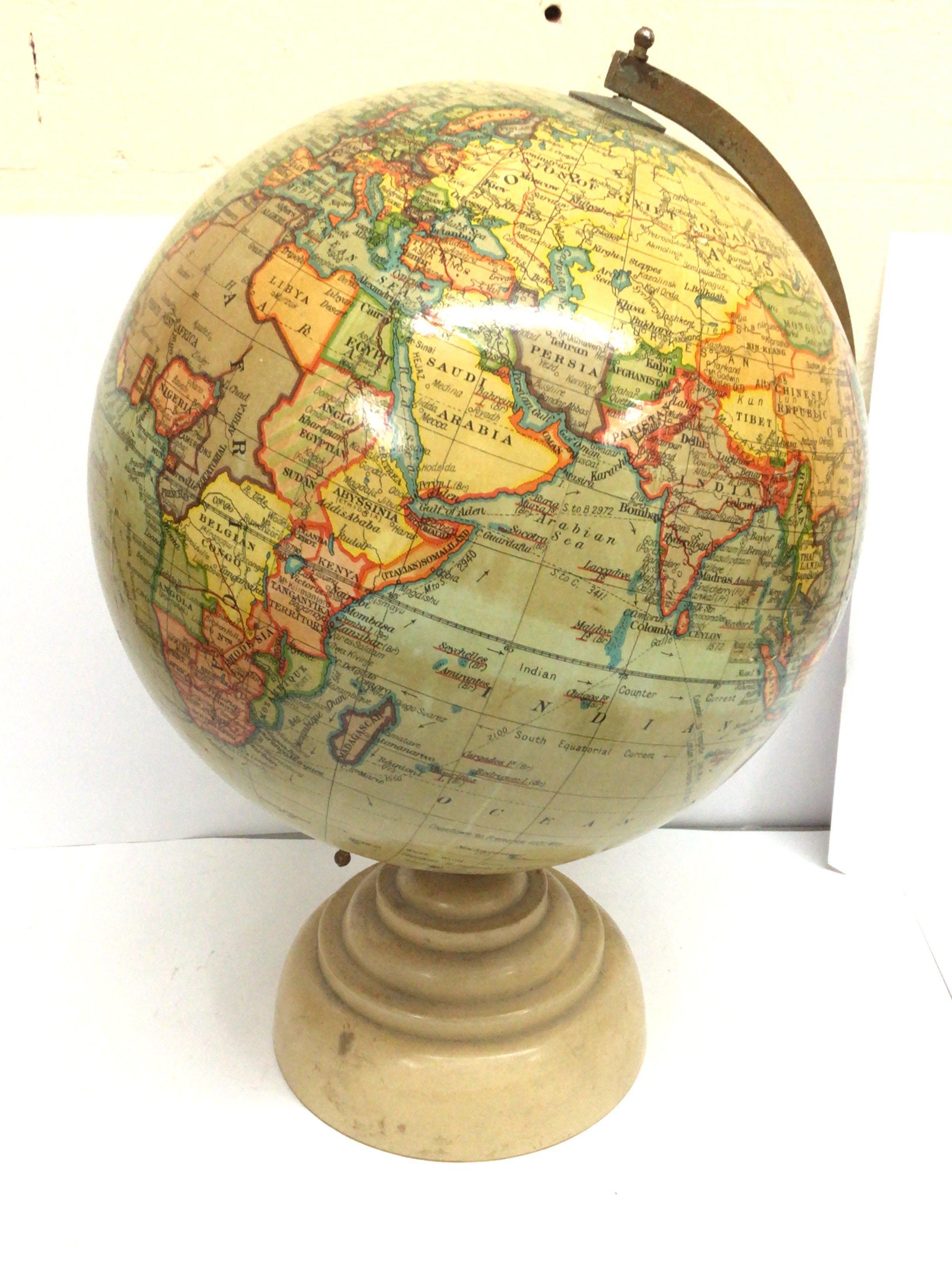 A 10 inch terrestrial globe , 36cm tall.postage ca