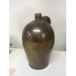 An interesting 19th century stoneware wine flagon