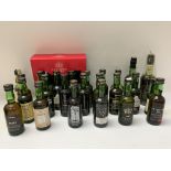 A collection of Miniture vintage ports.