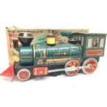 Vintage Japanese tin plate locomotive in original