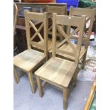 Four oak dining chairs. Shipping category D.