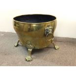 Brass pot decorated with lions heads and feet, app