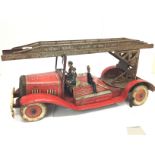 A 1950s english tin plate fire engine . Postage cat C