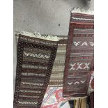 Three hand knotted rugs two runners both with hori