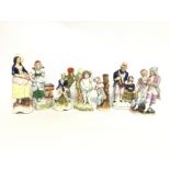 A collection of Staffordshire figures and other, r
