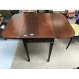 A reproduction mahogany Pembroke table. Shipping c