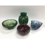 Four coloured glass items comprising a vase and th