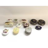Mixed collection of trinket boxes.