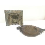 A Victorian cast metal miniature fire place Hight 20cm and an antique copper dish (2)