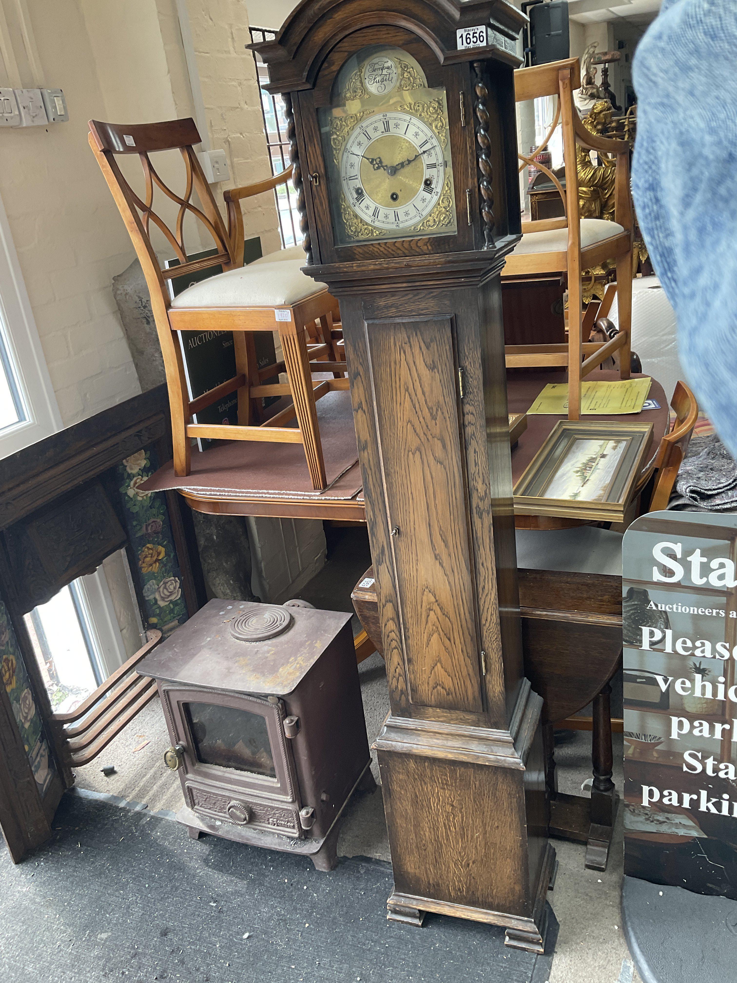 A 1950s oak granddaughter clock, Catagory D. 171cm