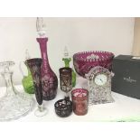 A collection of flash overlay and cut glass a boxed Waterford Crystal clock a pair of green glass