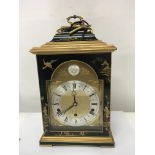 A Quality black lacquer Chinoiserie mantel clock maker Elliot made in England the brass dial with