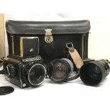 Cased Bronica 6x6 camera, lenses and vintage acces