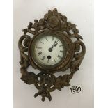 A late 19th century painted metal wall clock 28cm