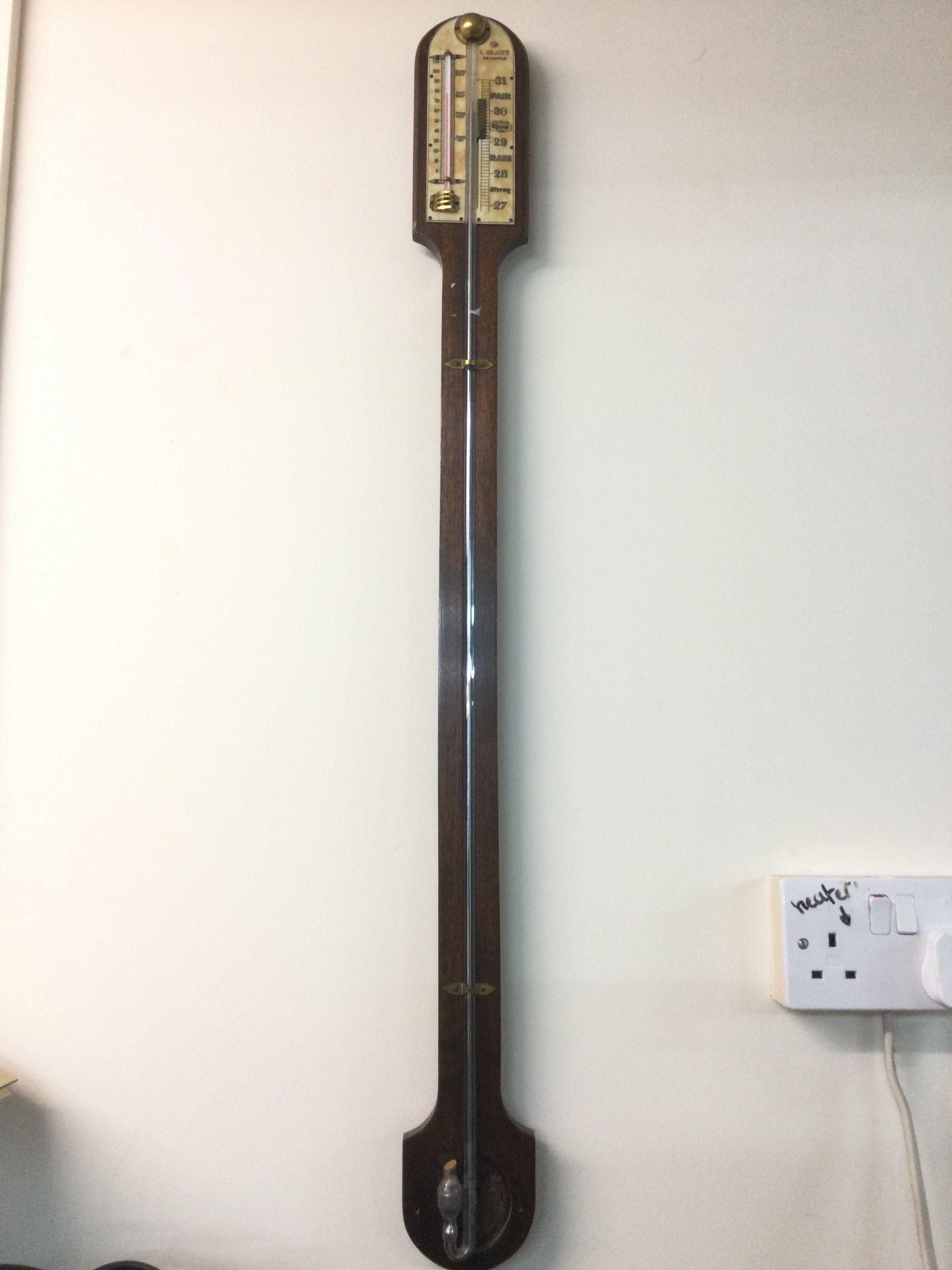 A mercury filled mahogany stick barometer.