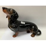 A large Beswick model of a Dachshund. 17 x 39cm.