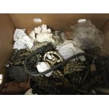 A box containing a large quantity of vintage brass door knockers mixed design (a lot)