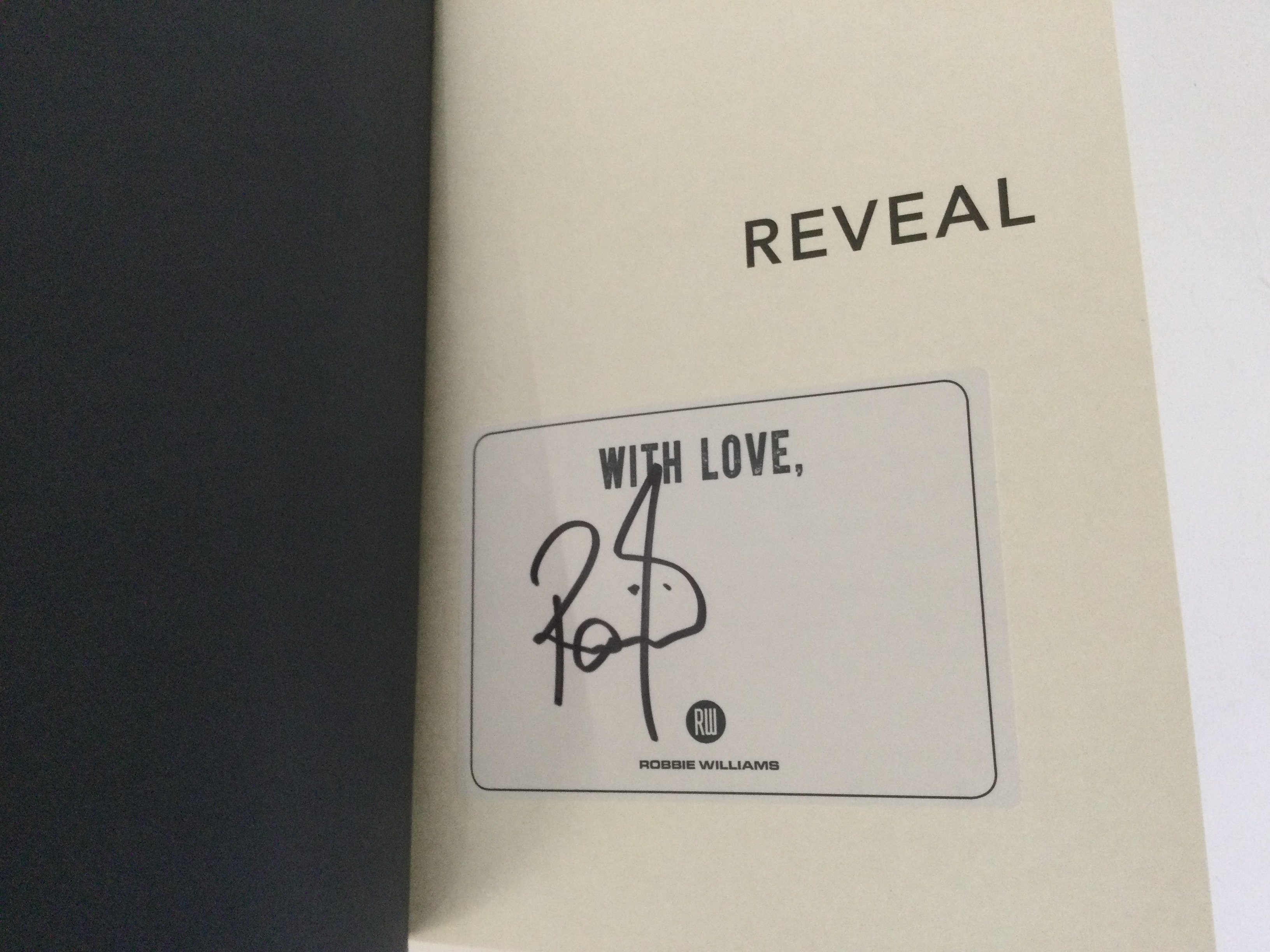 A signed Robbie Williams book 'Reveal' together wi - Image 2 of 2